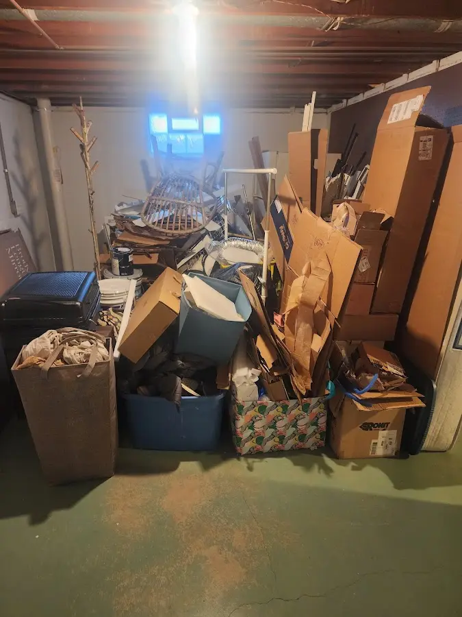 Roll-off dumpster container at job site for 2 Yard Dumpster Rental in Pikesville